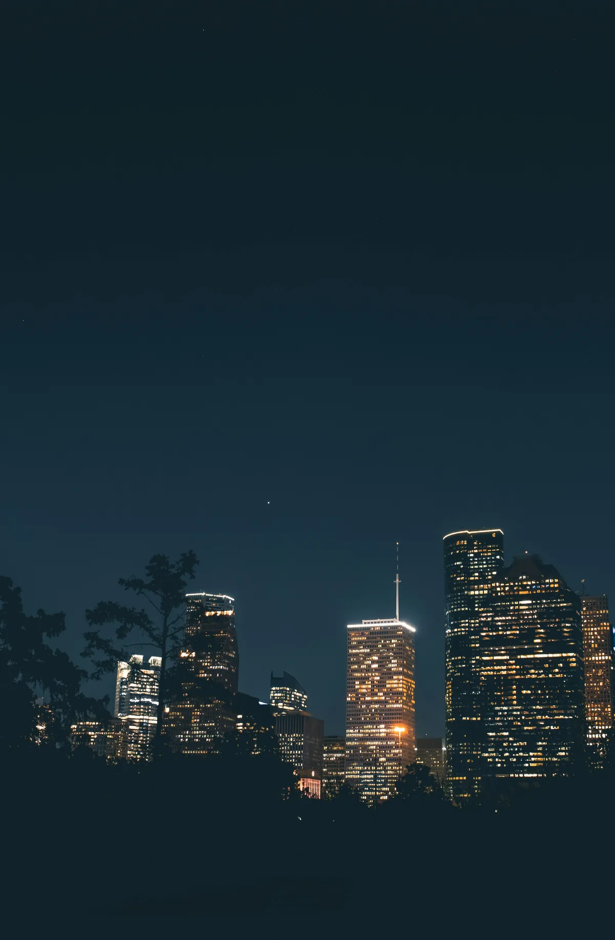 Houston skyline at night representing Whetzel CPA's downtown roots